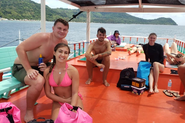 Happy customers smiling during Lakbay Palawan boat adventure